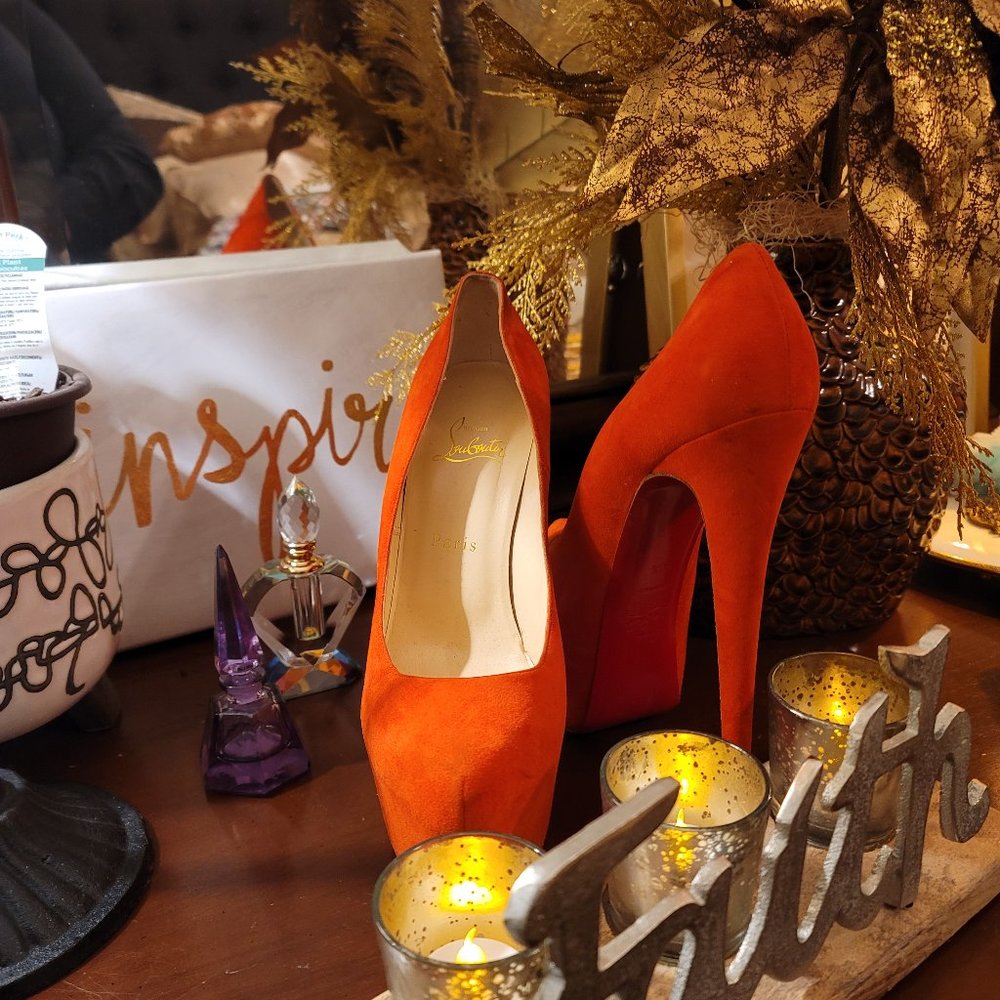 Authentic red suede Christian Louboutin red bottoms